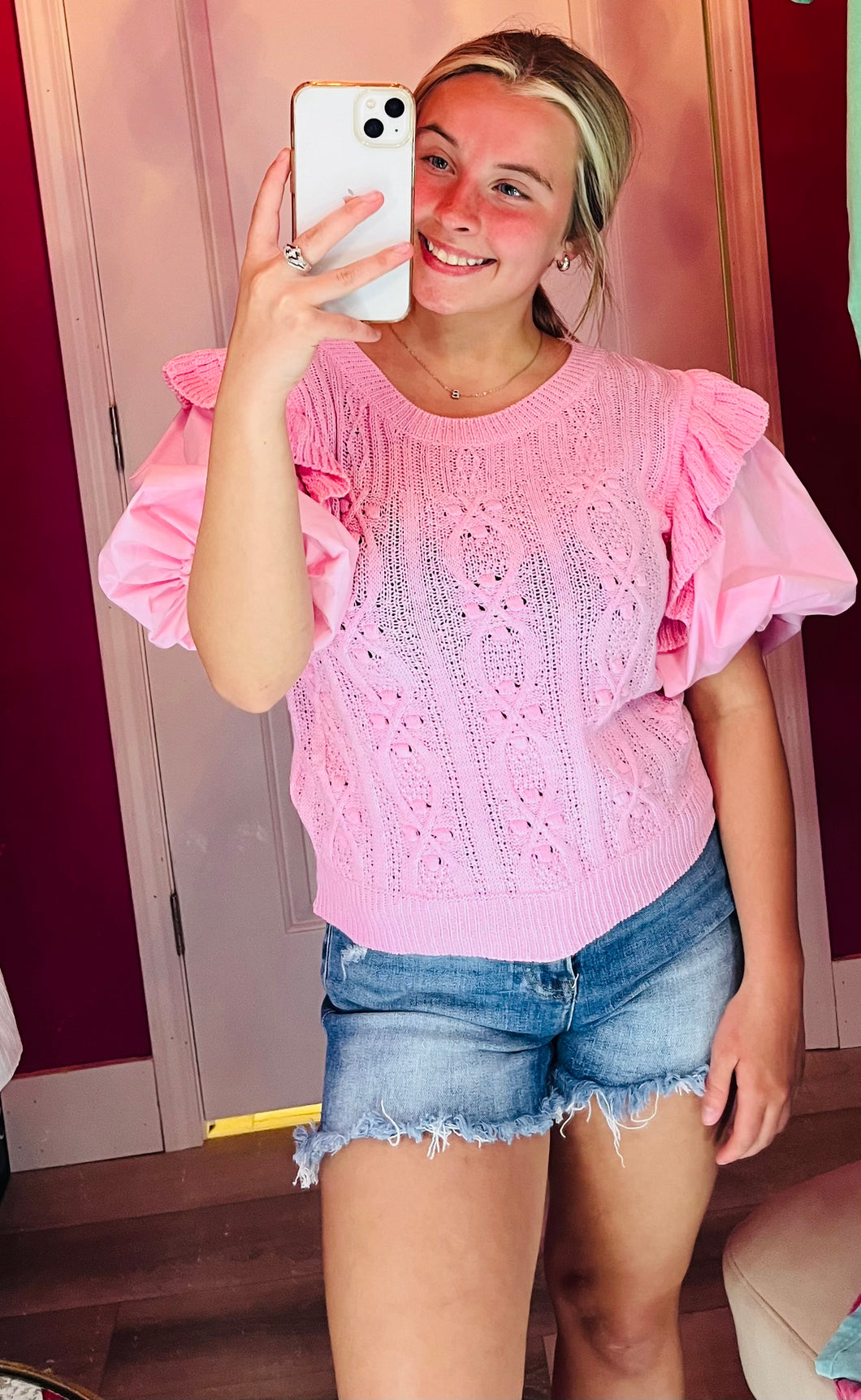 pink knit blouse