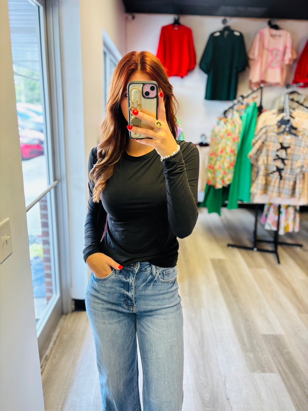 Black fitted long sleeve top