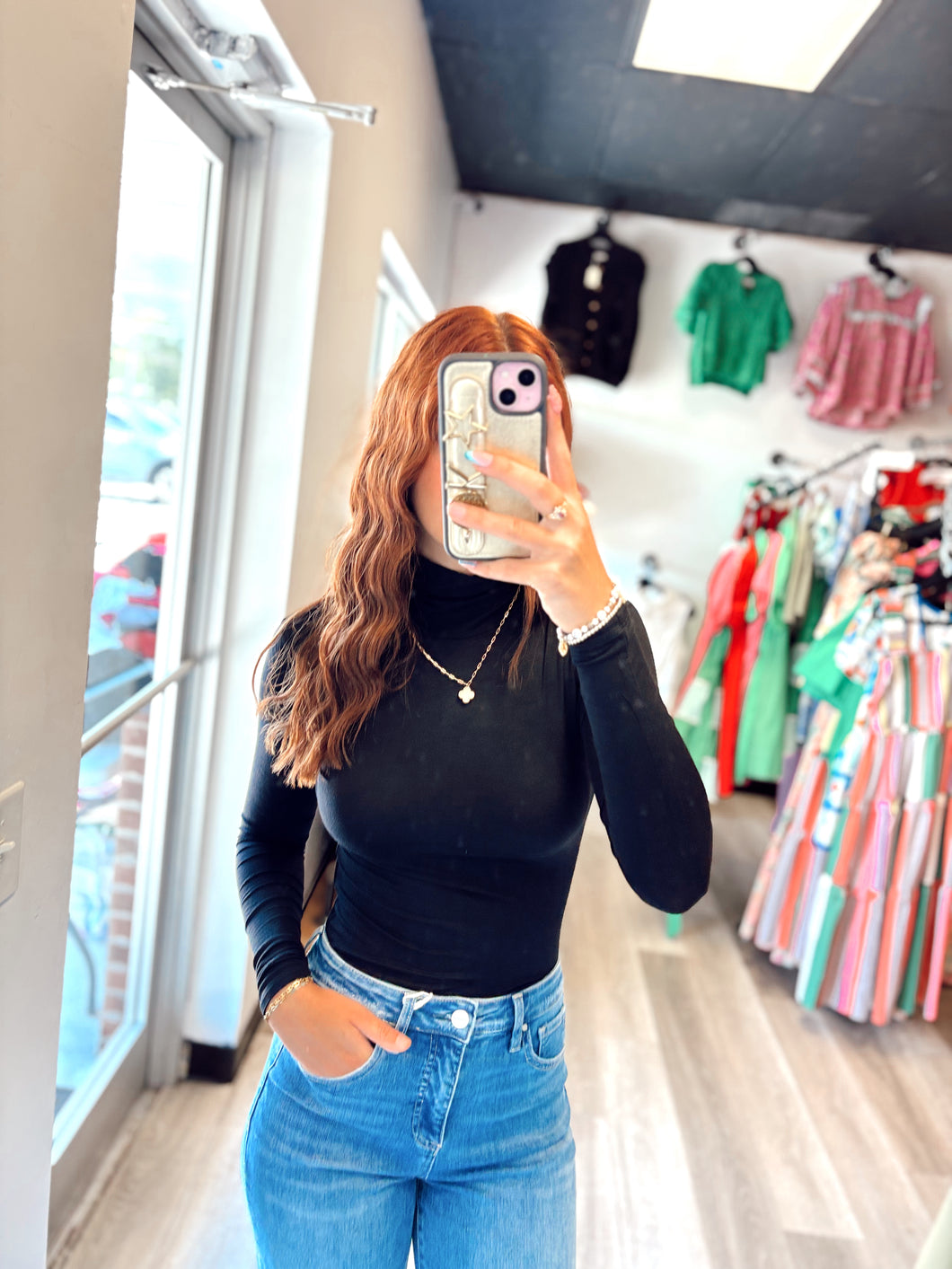 Black turtle neck bodysuit