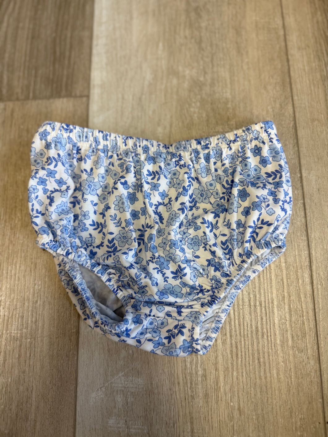 Blue floral ruffle bottom