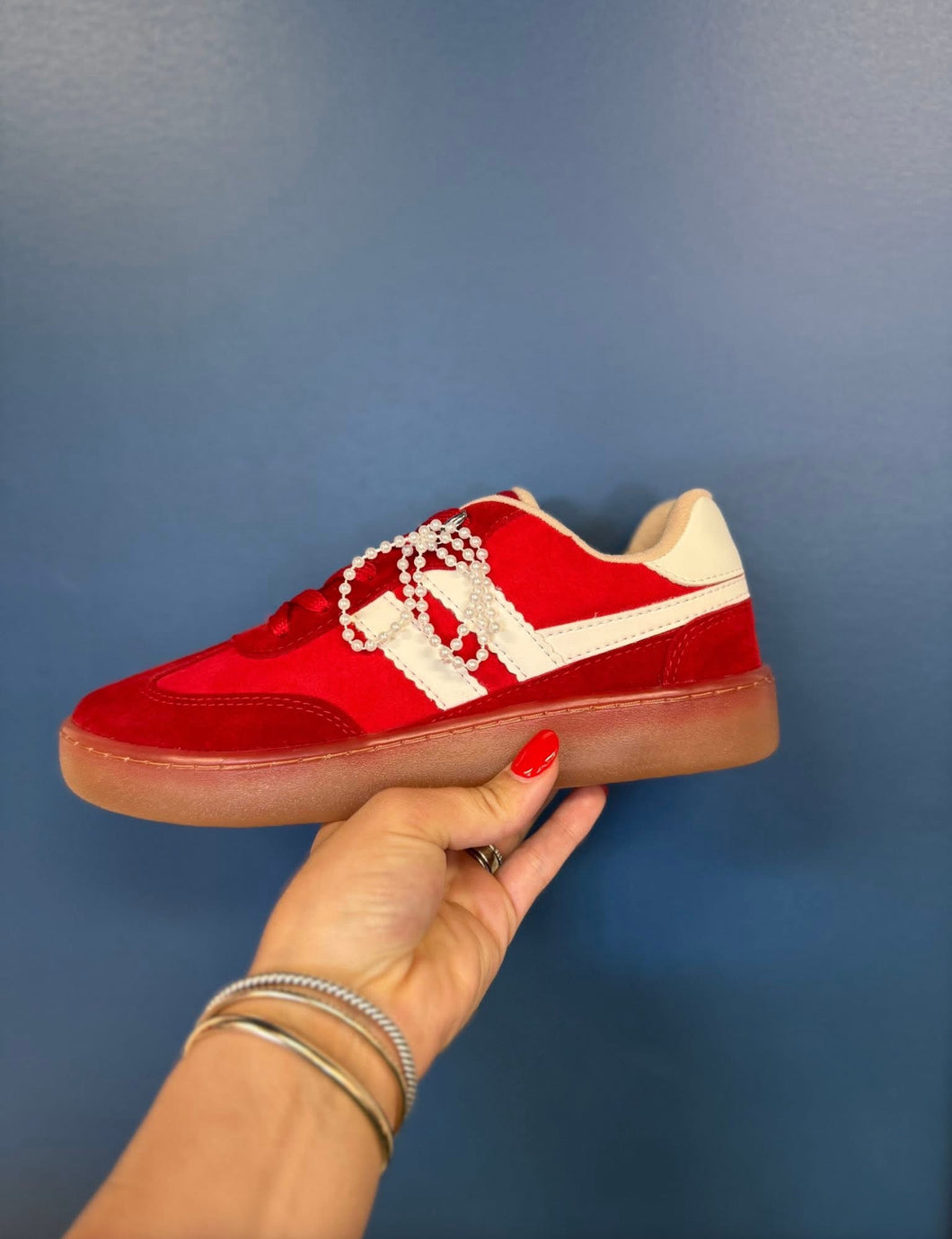 Red bow tennis shoes