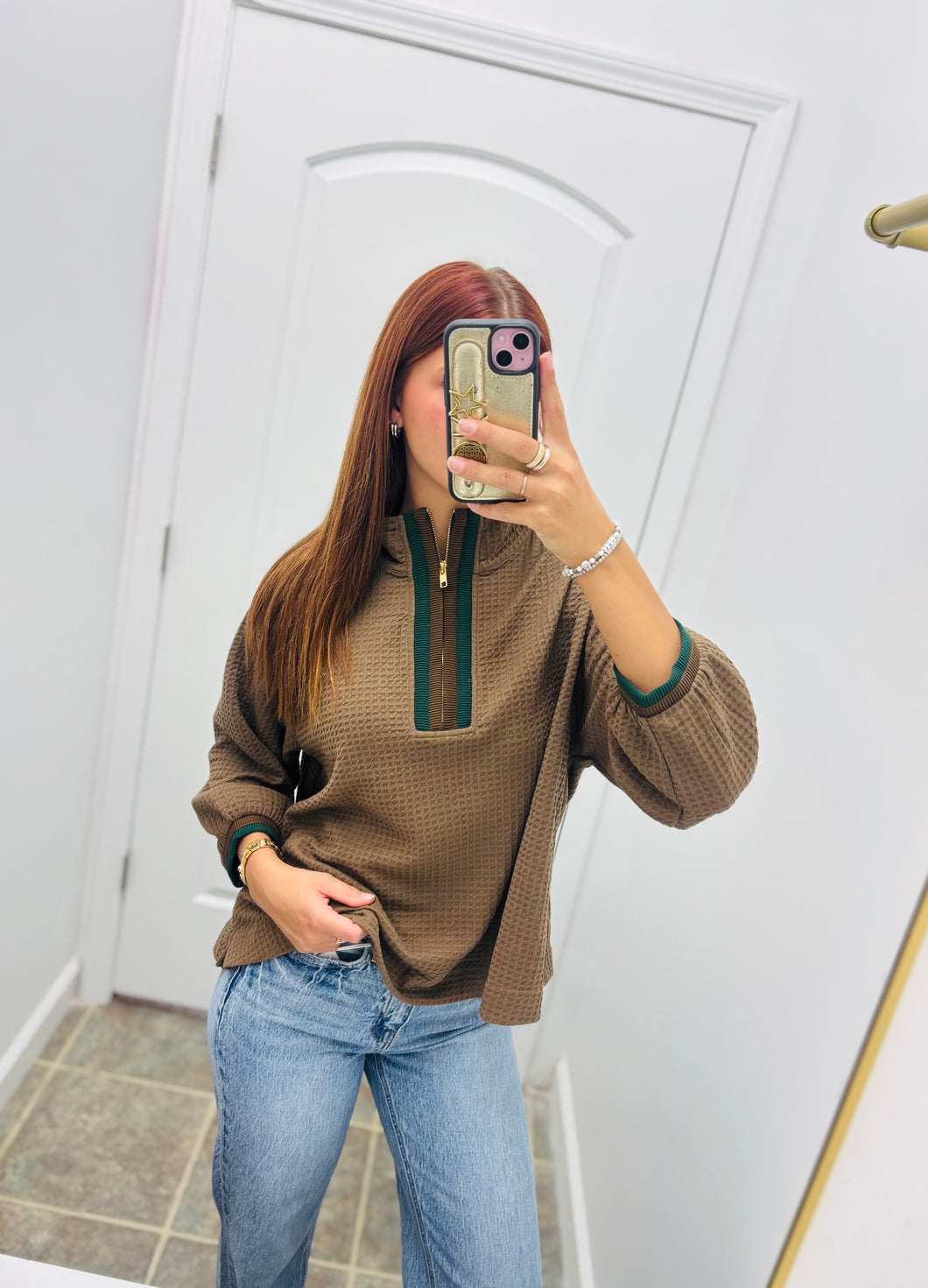 Brown waffle knit pullover with contrast zip trim