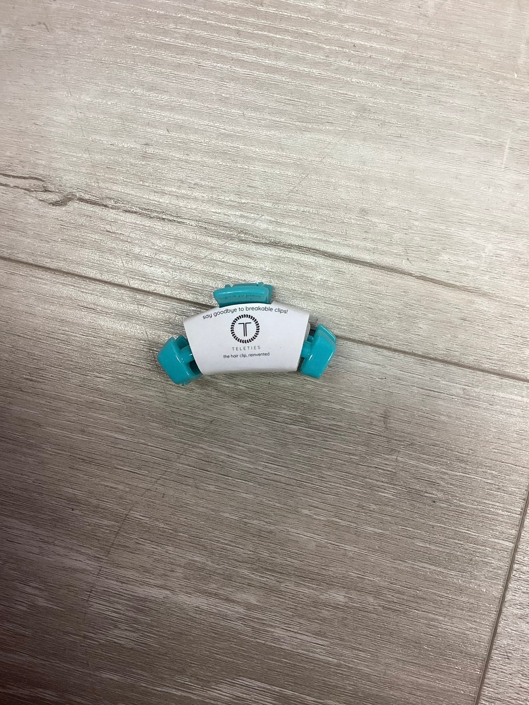 Tiny baby blue clip