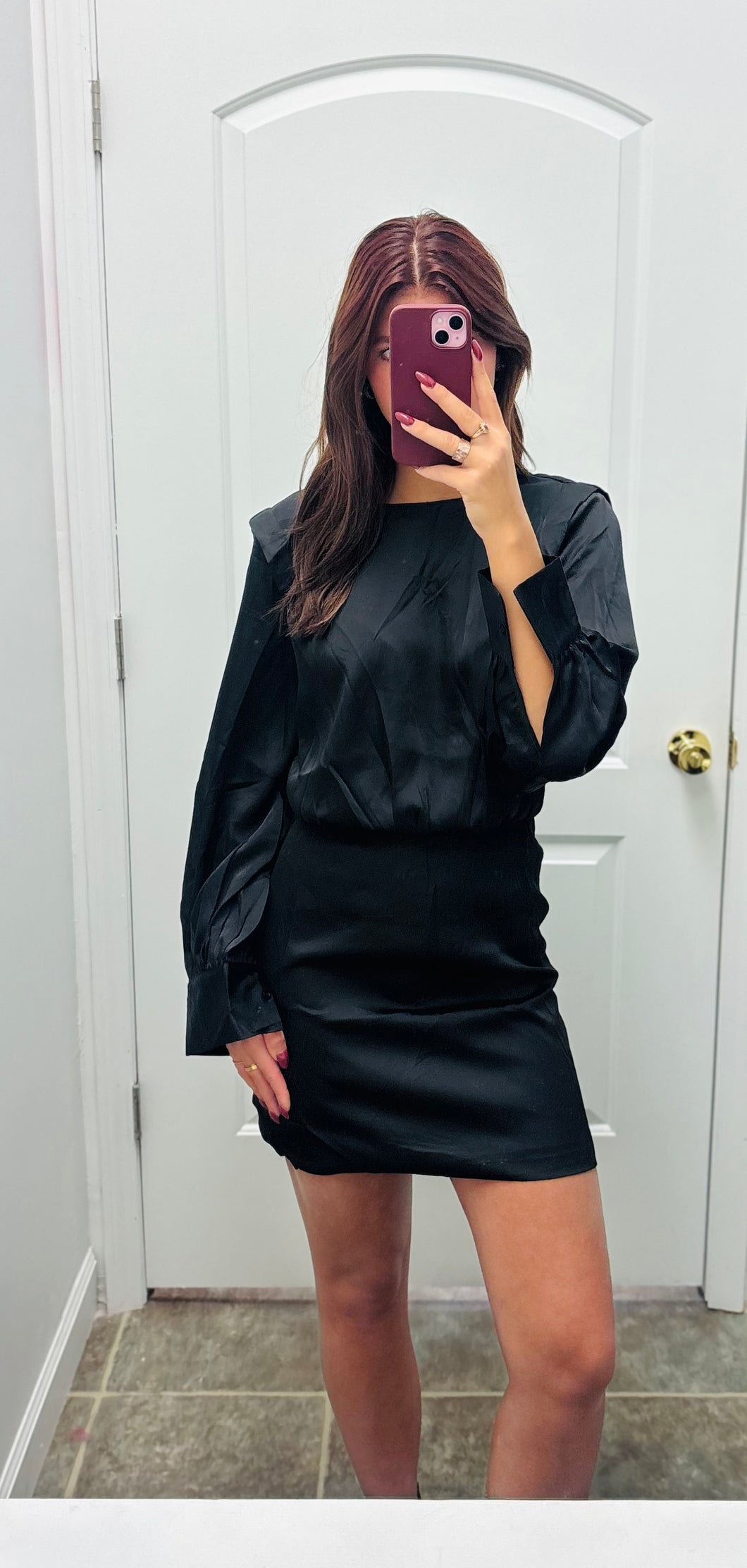 Black shoulder pad mini dress