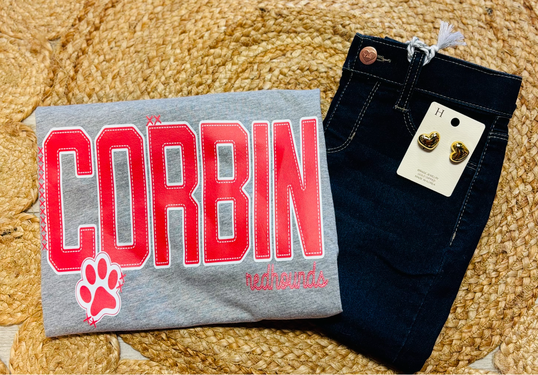 Corbin Redhounds with paw print
