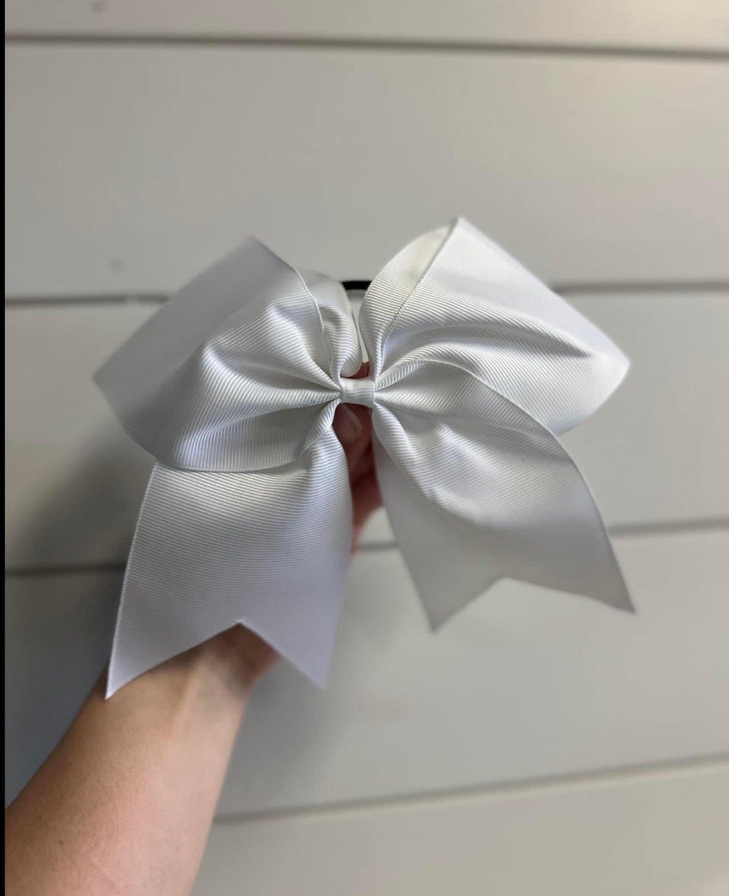 White cheer bow