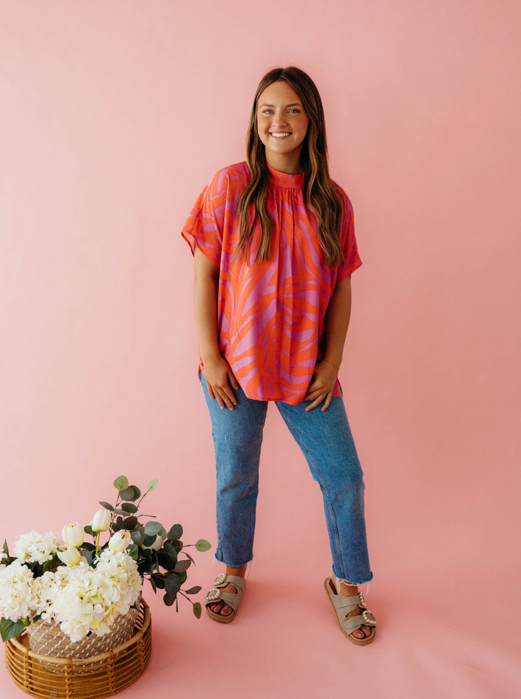 Orange and purple striped blouse