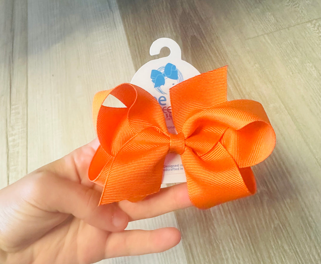 Wee ones no slip clip bow orange small