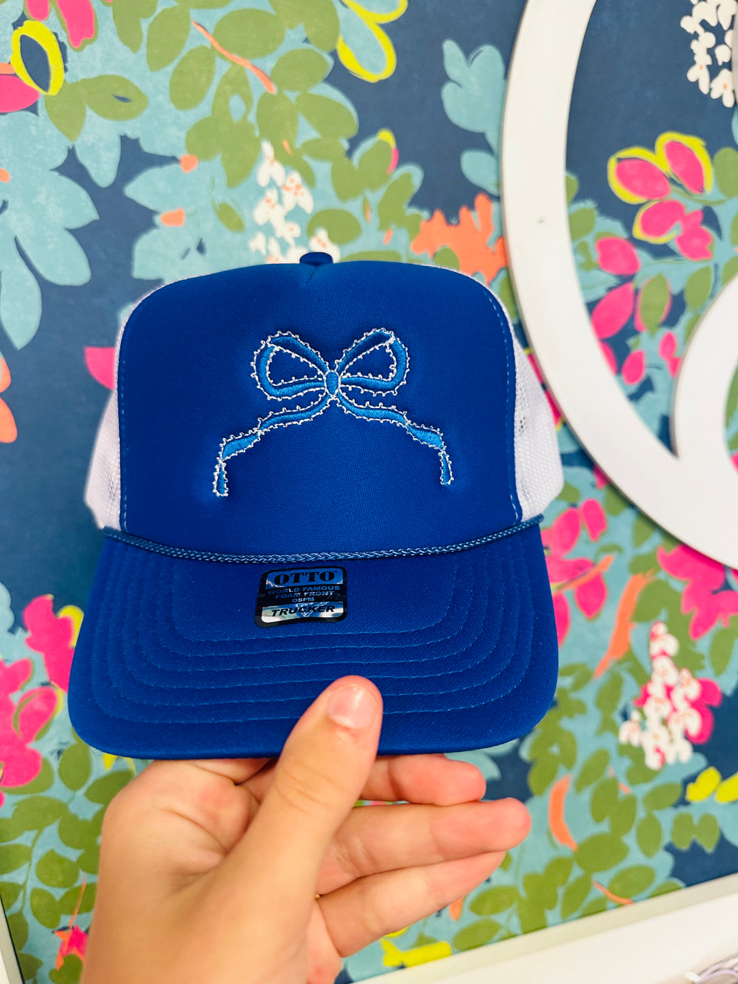 Blue emb trucker hat bow