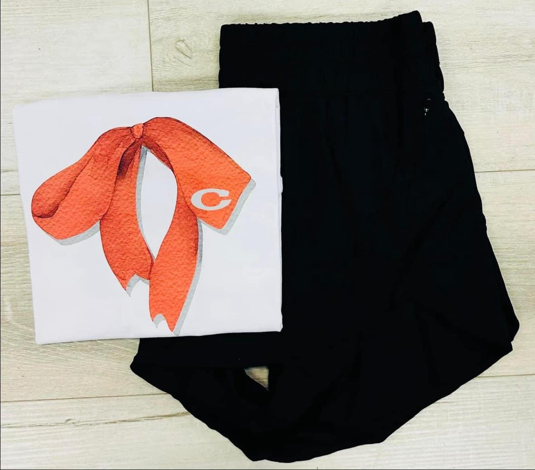 White Corbin tee with red bow