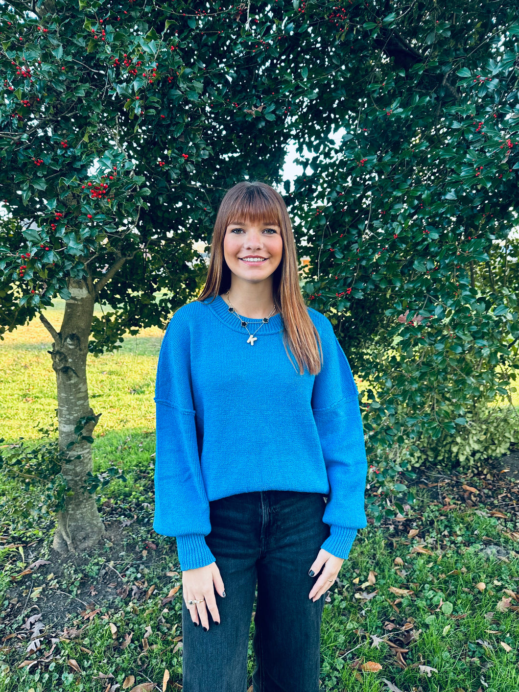 bright blue sweater