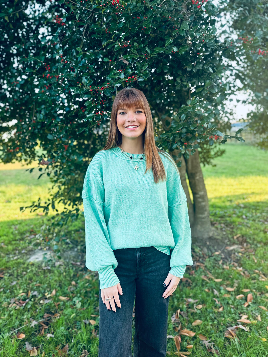 light green sweater